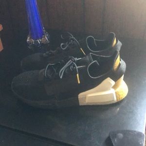 Adidas NMD black and gold size 10